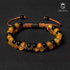Luxuriöses Natursteinarmband aus Onyx und Achat mit goldbraunem Band – stilvoll und kraftvoll zugleich.